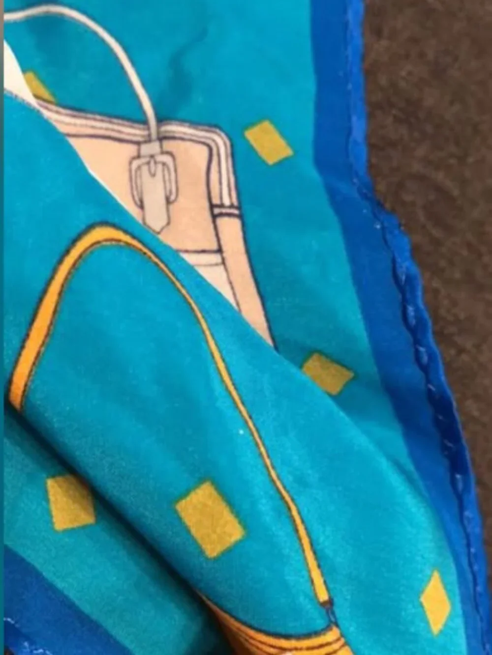 Purses and Handbags on Blue Silk Scarf